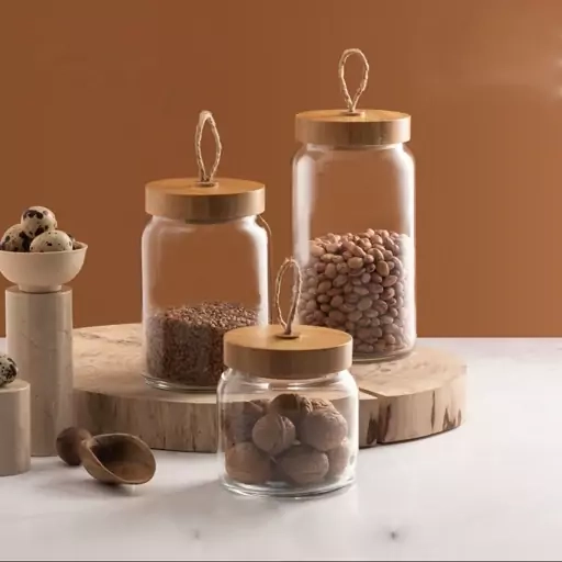 ظرف شیشهای شفاف Pasabahce مدل Woody با طراحی ساده و درب چوبی محکم برای استفاده در آشپزخانه